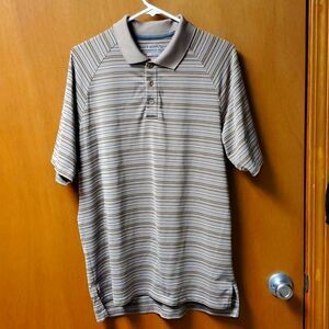 Under Armour heat gear polo, medium loose fit